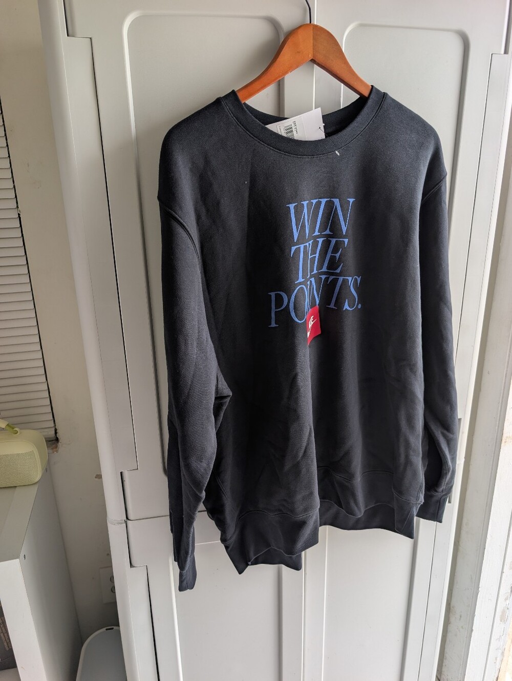 Nike Black Crewneck "Win The Points" Sweatshirt with Blue Text and Red Accent